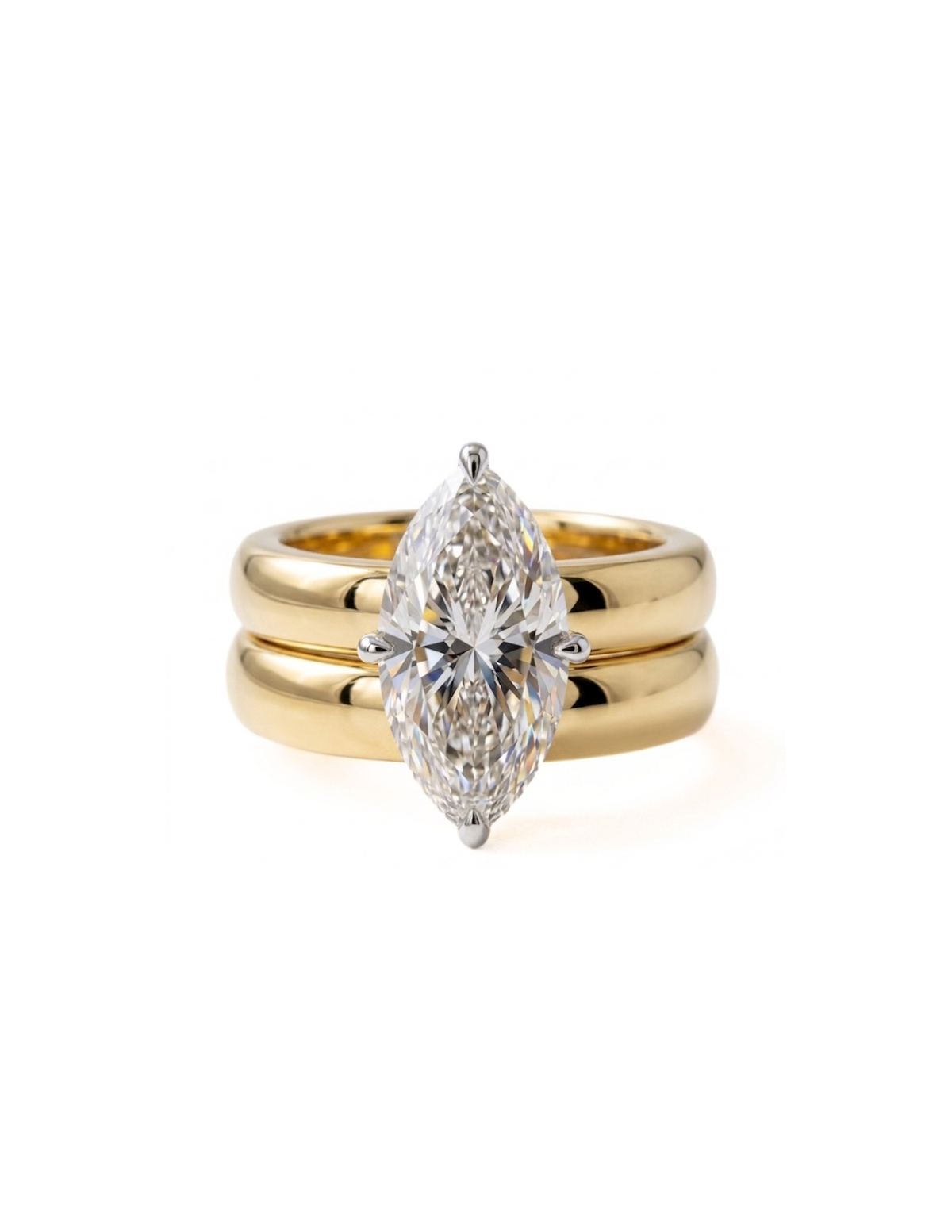 Gold ring with a large diamond on a white background