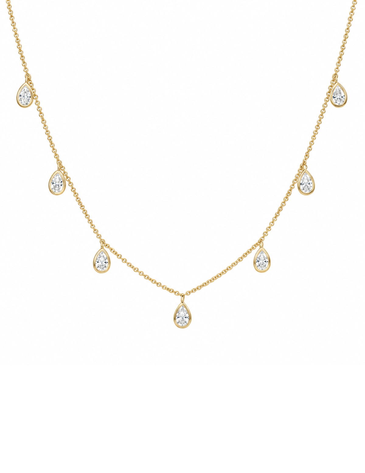 A delicate gold chain necklace featuring seven small teardrop-shaped clear gemstones spaced along the chain, with a larger matching teardrop pendant hanging at the center, set against a plain white background.